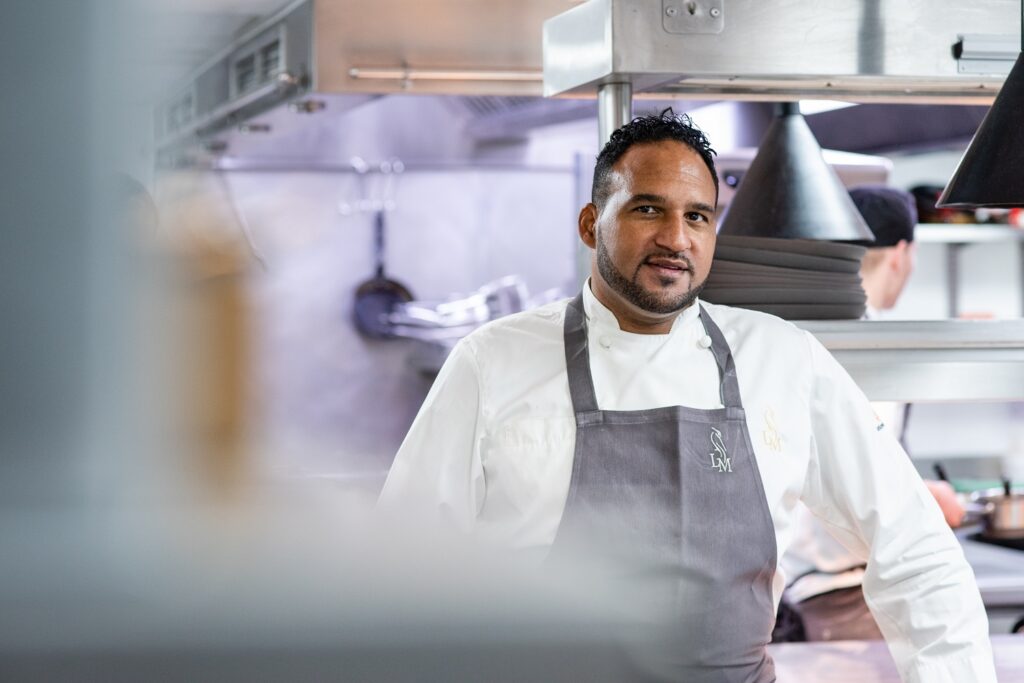 Michael Caines in his kitchen at Lympstone Manor preparing for his wine tasting and fine dining experience.