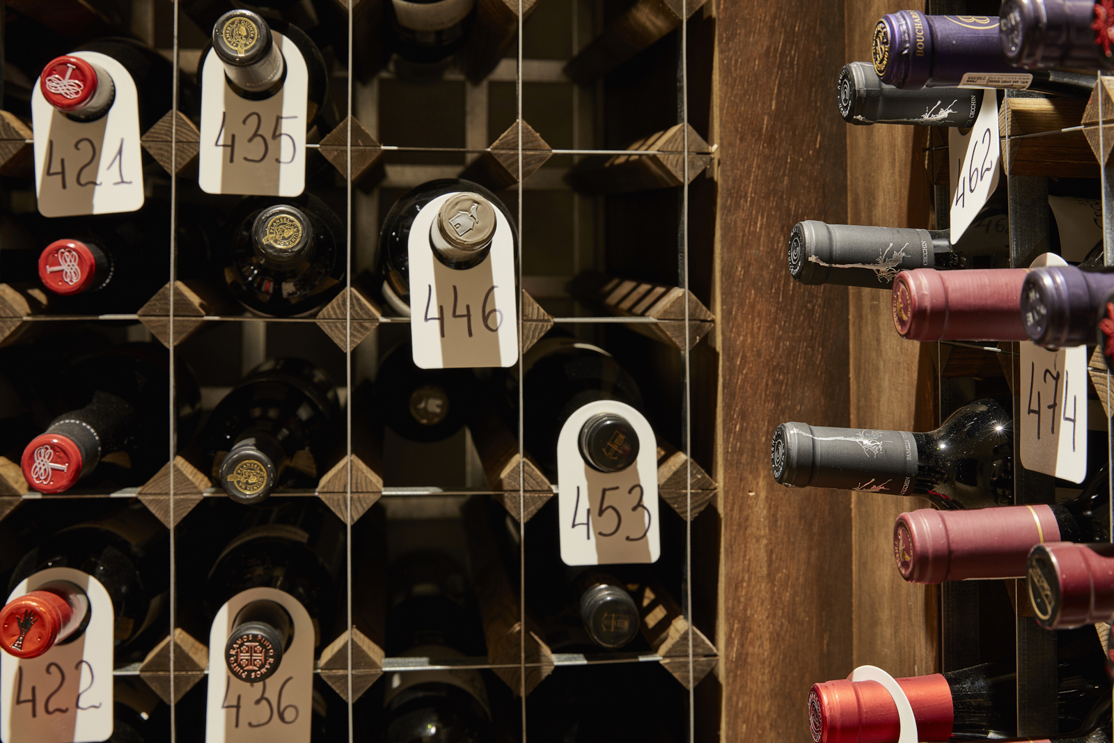 Lympstone Manor Hotel wine cellar showing bottles of wine on the shelves